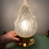 Old laying flame lamp