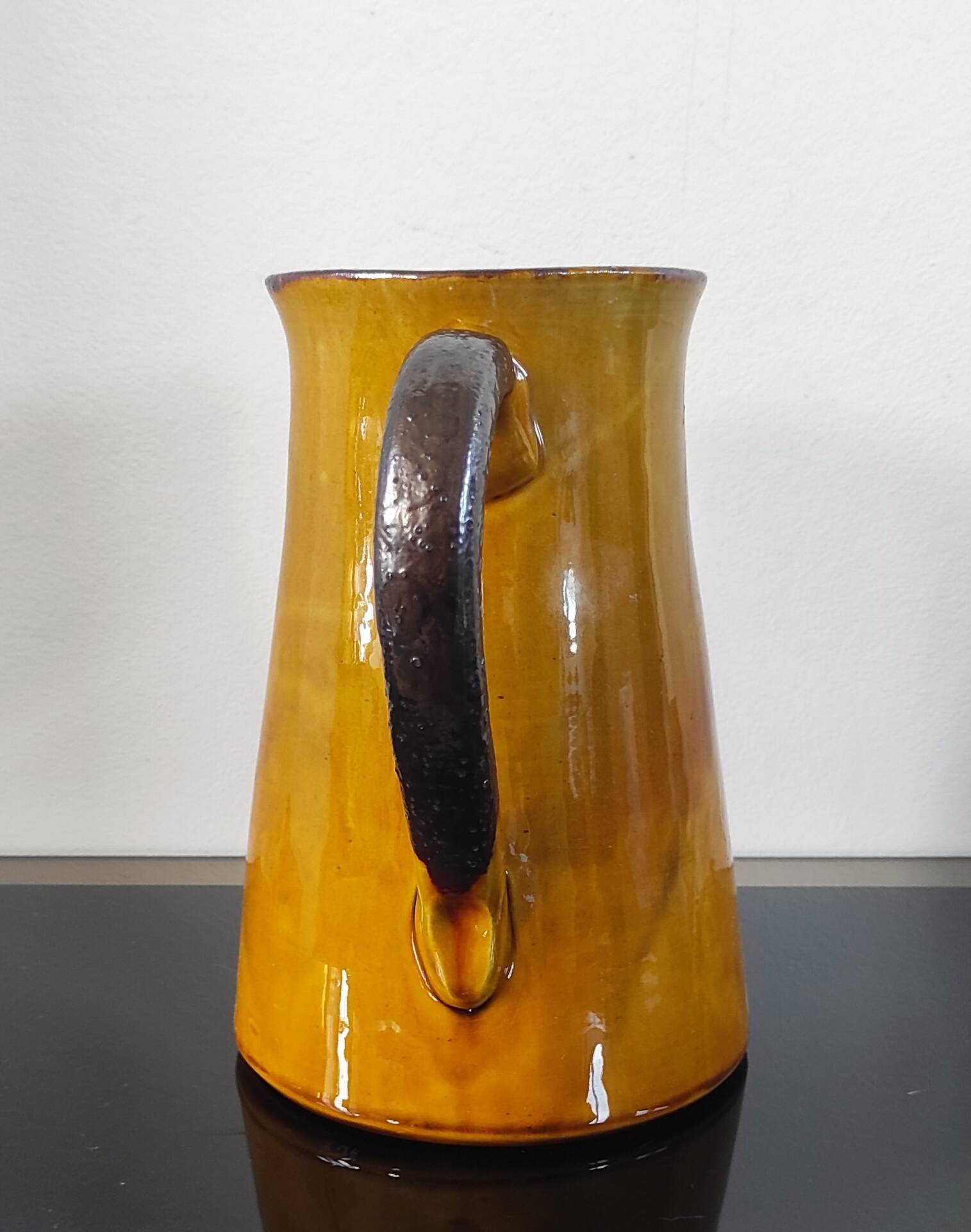 Vintage glazed terracotta pitcher