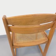 Vintage sleigh chair in beech wood and cane from the 70s and 80s