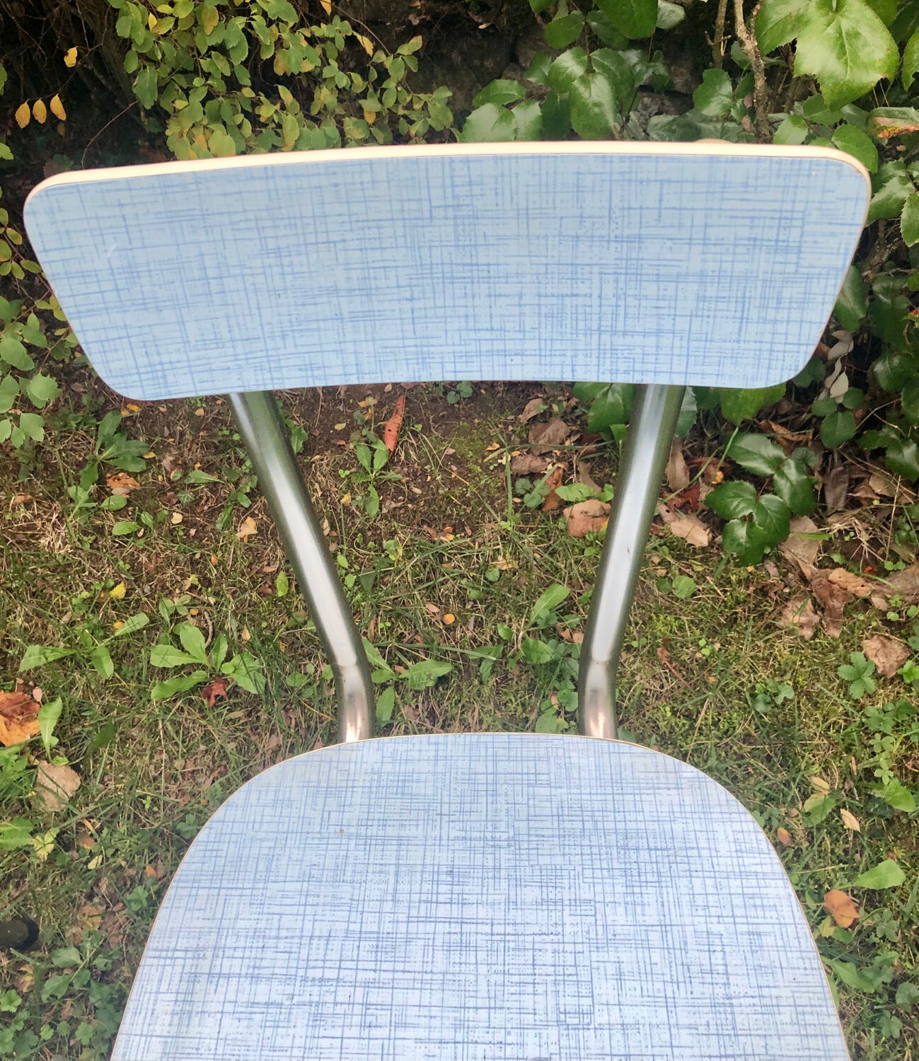 2 blue formica chairs
