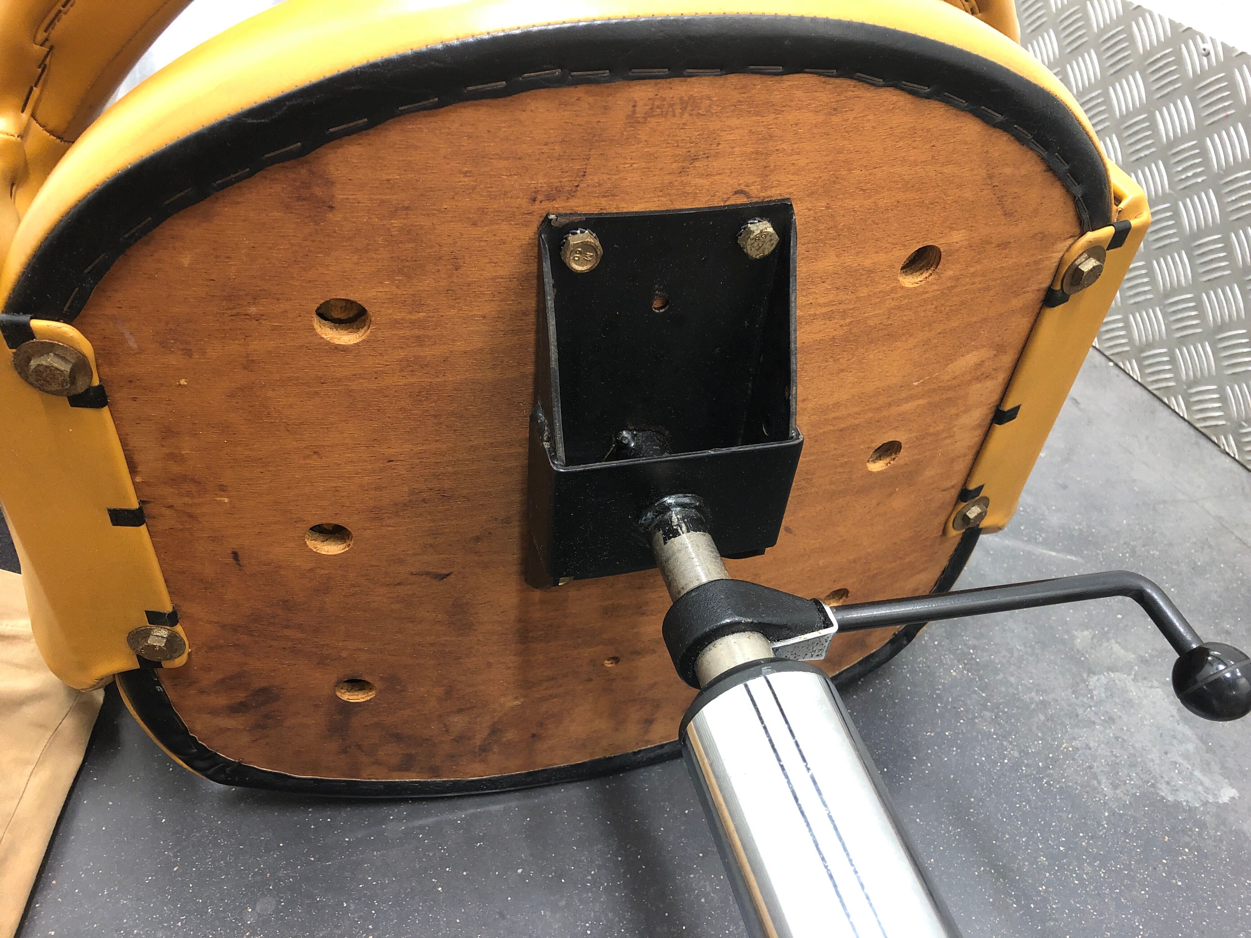 Vintage office chair in mustard yellow skai circa 1960