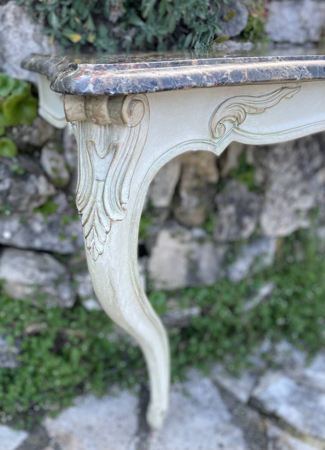 Wall console in painted, carved and molded wood in Louis XV style.