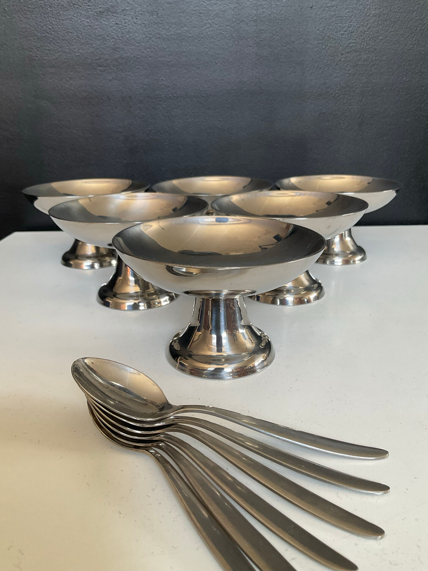Set of 6 vintage stainless steel ice cream bowls with spoons.