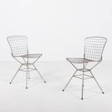 Pair of vintage Italian architectural design steel wire chairs from the 1970s