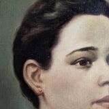 Oil on canvas portrait in an antique gilded wooden frame.