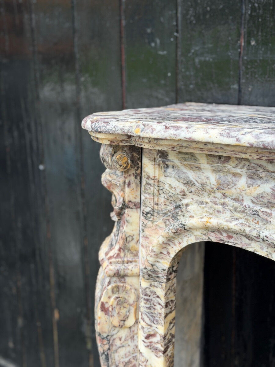 Louis XV style fireplace in Brocatelle marble, circa 1880.