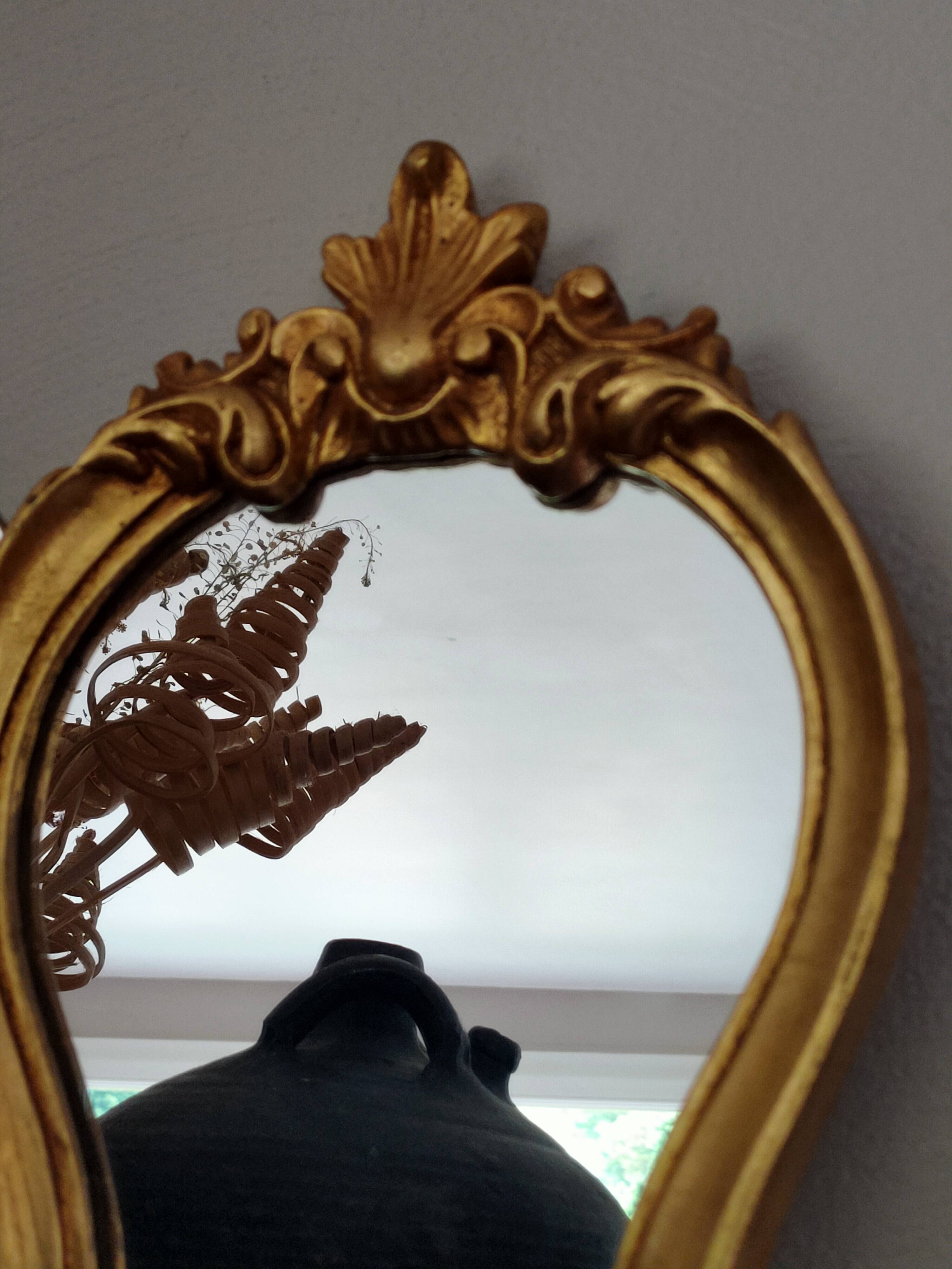 Baroque style gilded mirror.