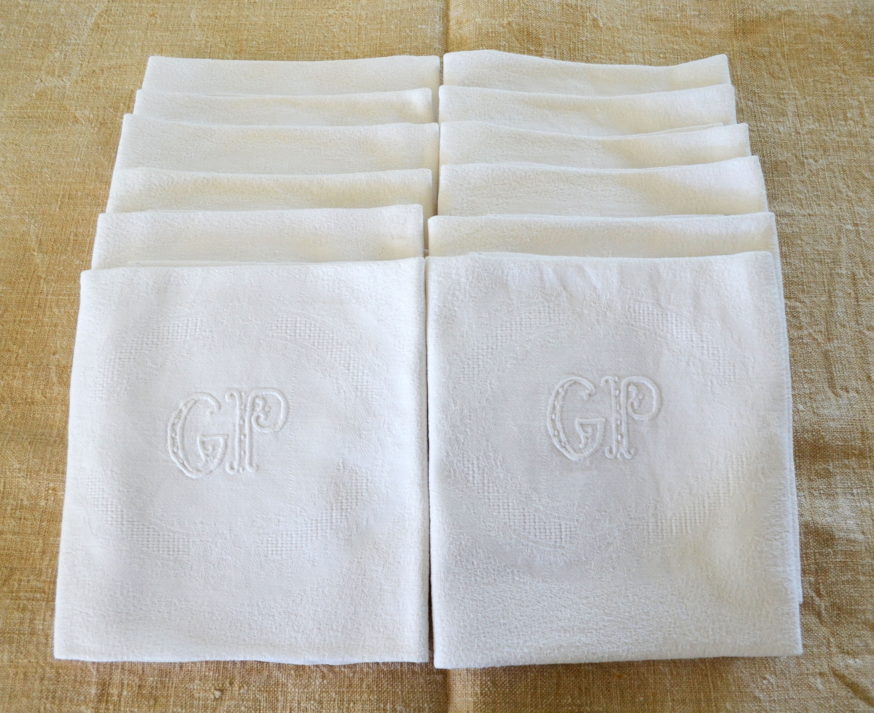 Set of 12 hand-embroidered cotton damask napkins