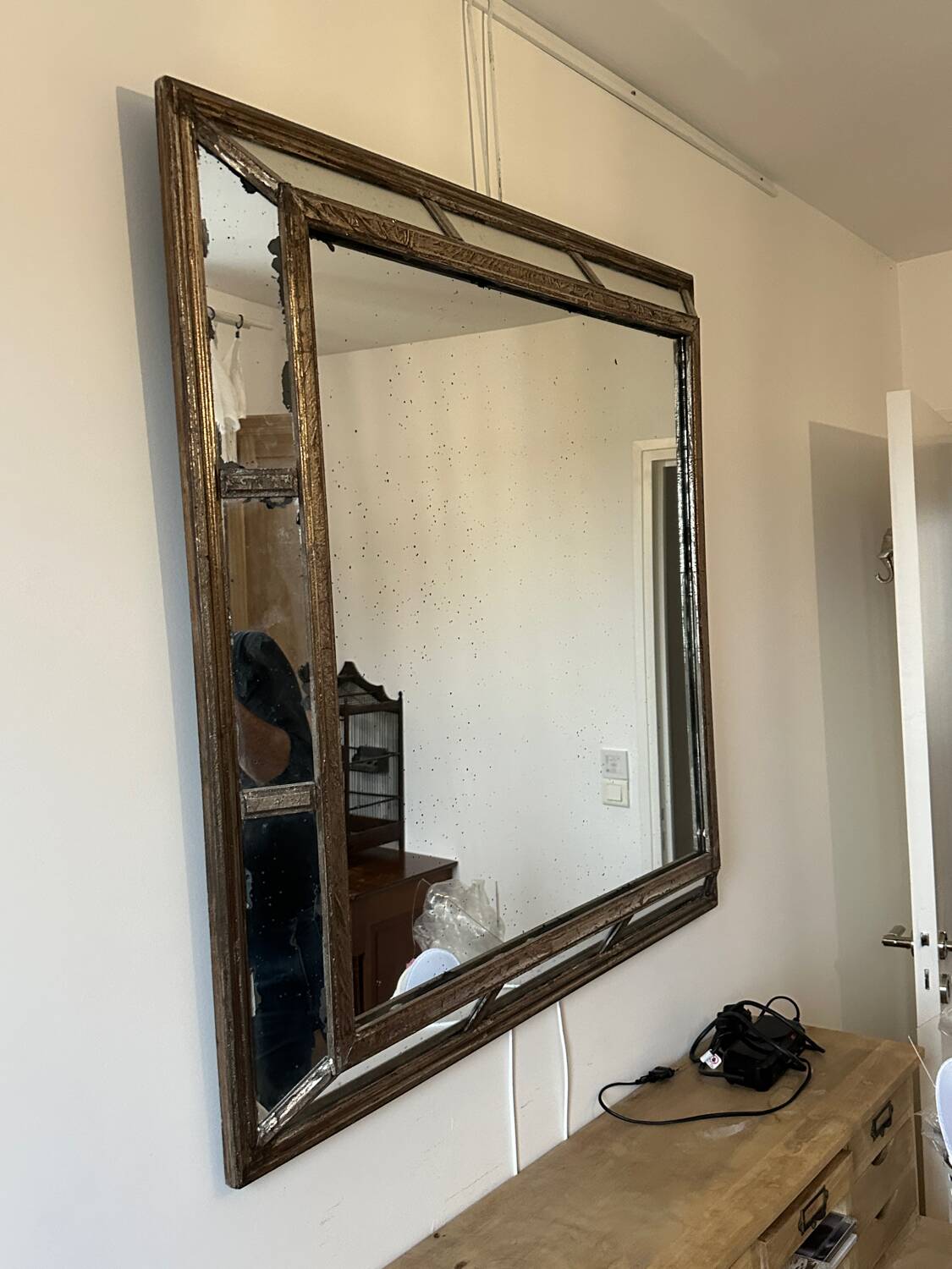 Antique mirror with wooden ornaments