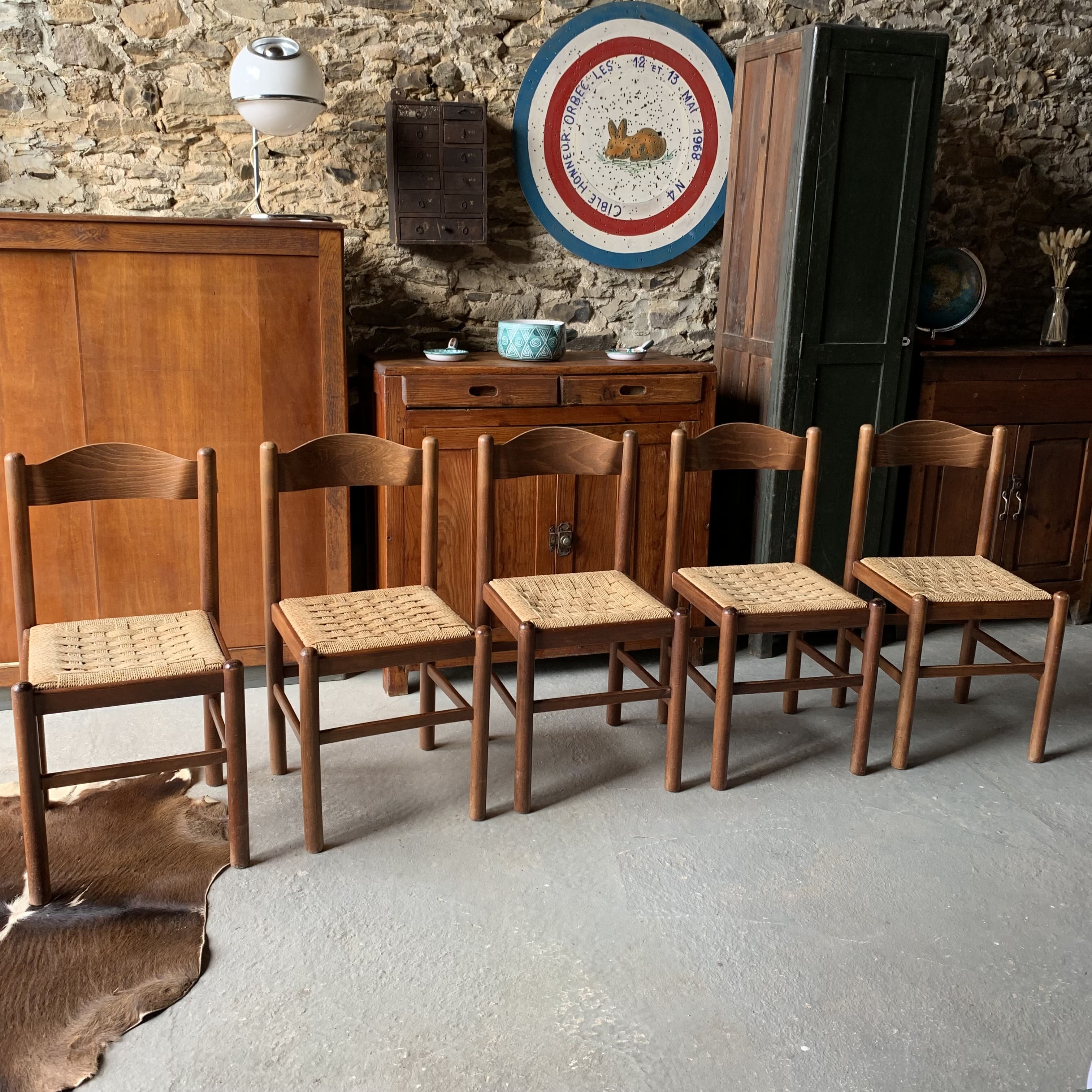 5 chairs made of wood and rope