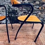 Pair of wooden and black metal chairs