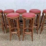 Lot de 7 tabourets de bar en bois courbé assise skaï rouge