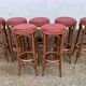 Lot de 7 tabourets de bar en bois courbé assise skaï rouge