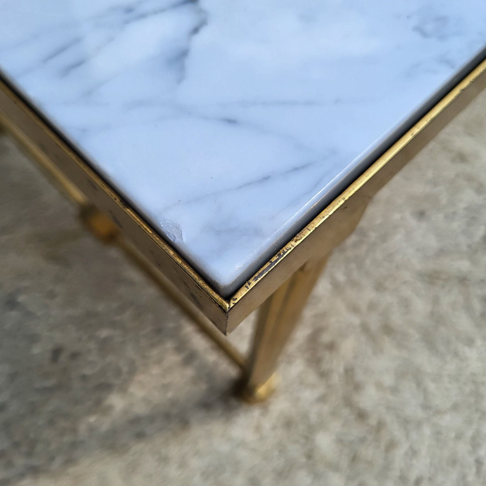 Hollywood Regency style coffee table • marble and brass