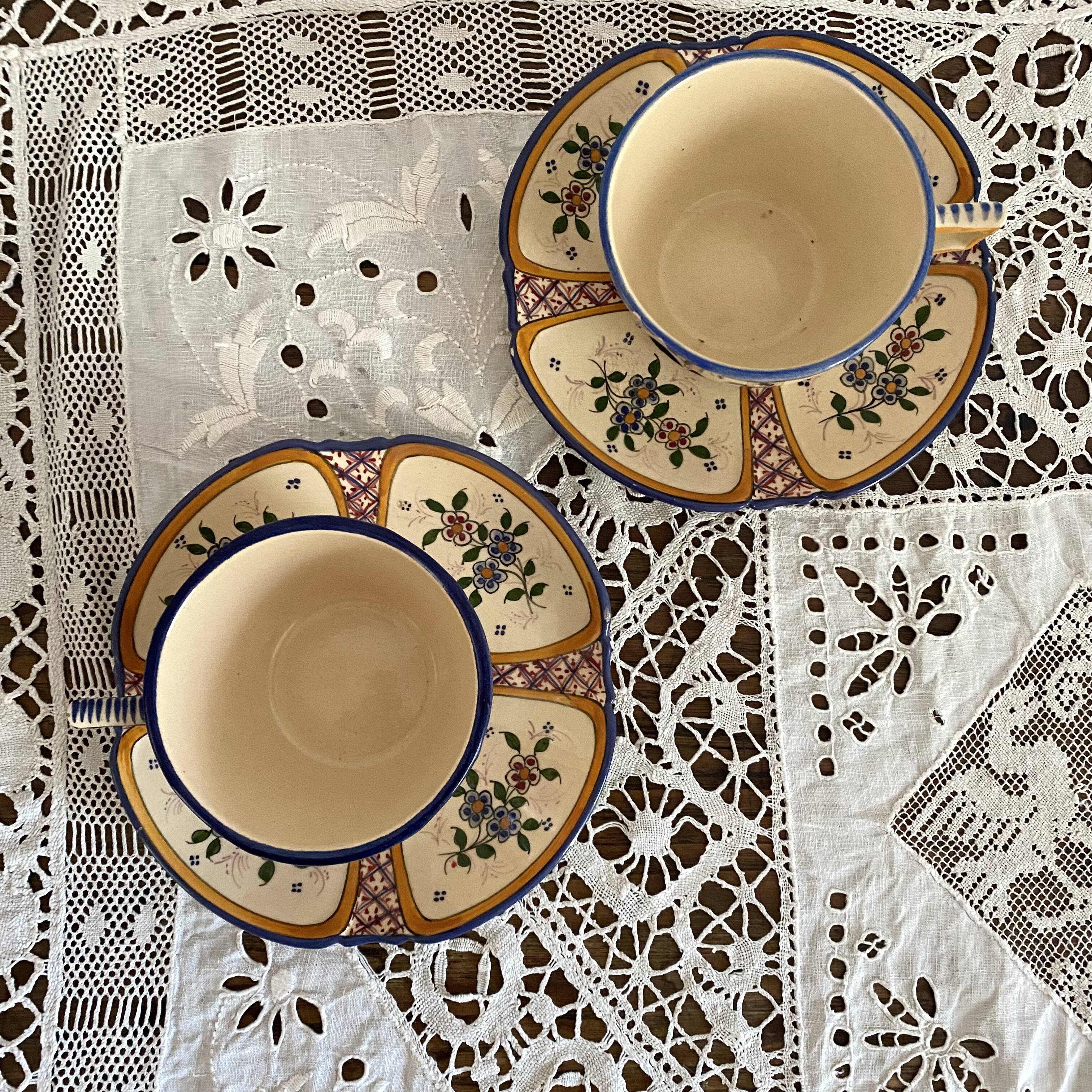Antique Quimper Henriot earthenware cups and saucers