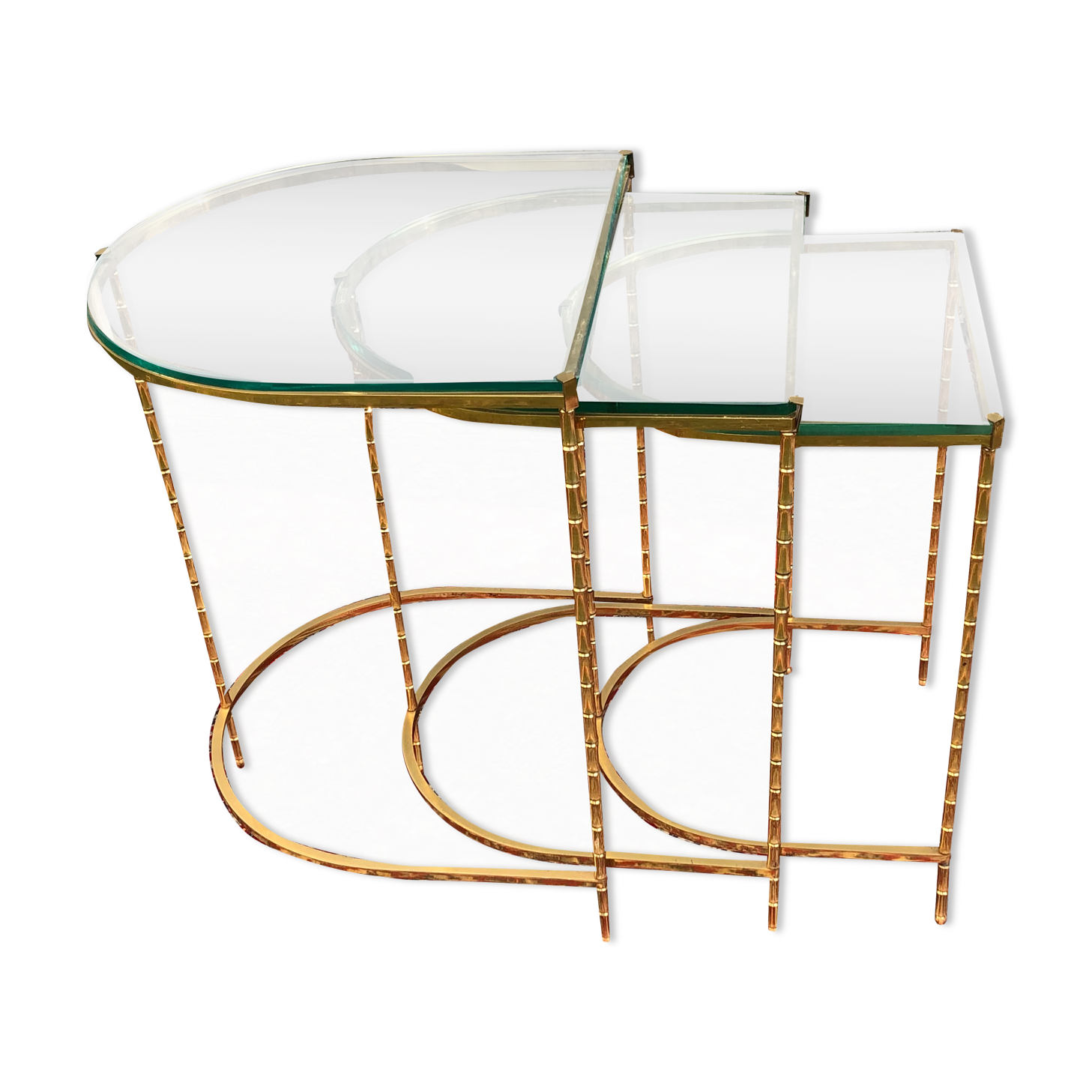 Suite of 3 trundle tables in golden brinze and glass slabs period 1970/1980