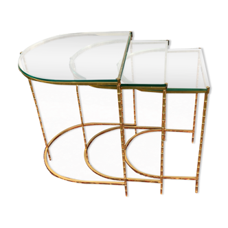 Suite of 3 trundle tables in golden brinze and glass slabs period 1970/1980