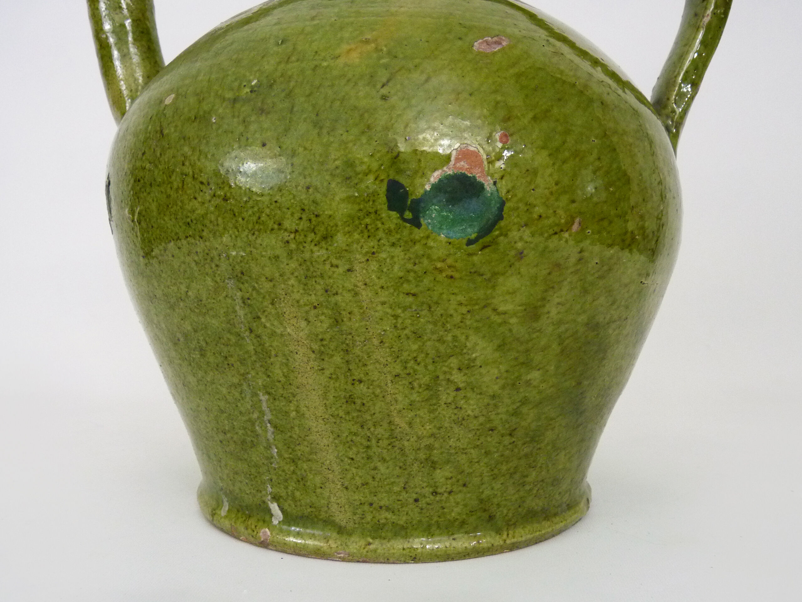 Orjol water pitcher pottery in green glazed terracotta. Pyrenees XIXth