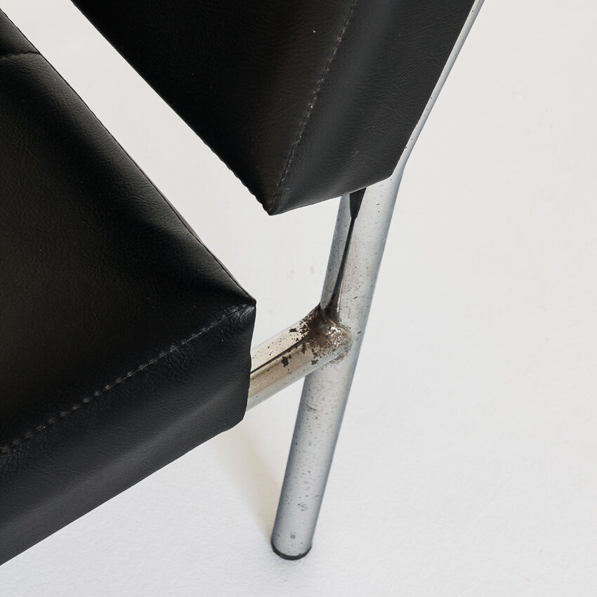 Pair of vintage low armchairs in chrome metal and skaï, Spain 1970