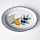Set of 3 vintage ceramic dishes with wicker baskets.