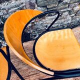 Pair of wooden and black metal chairs