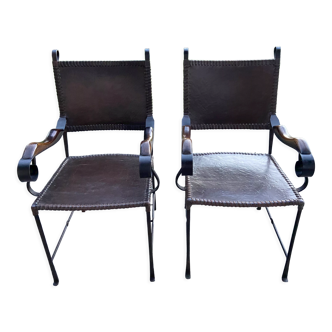 Leather and wrought iron armchairs