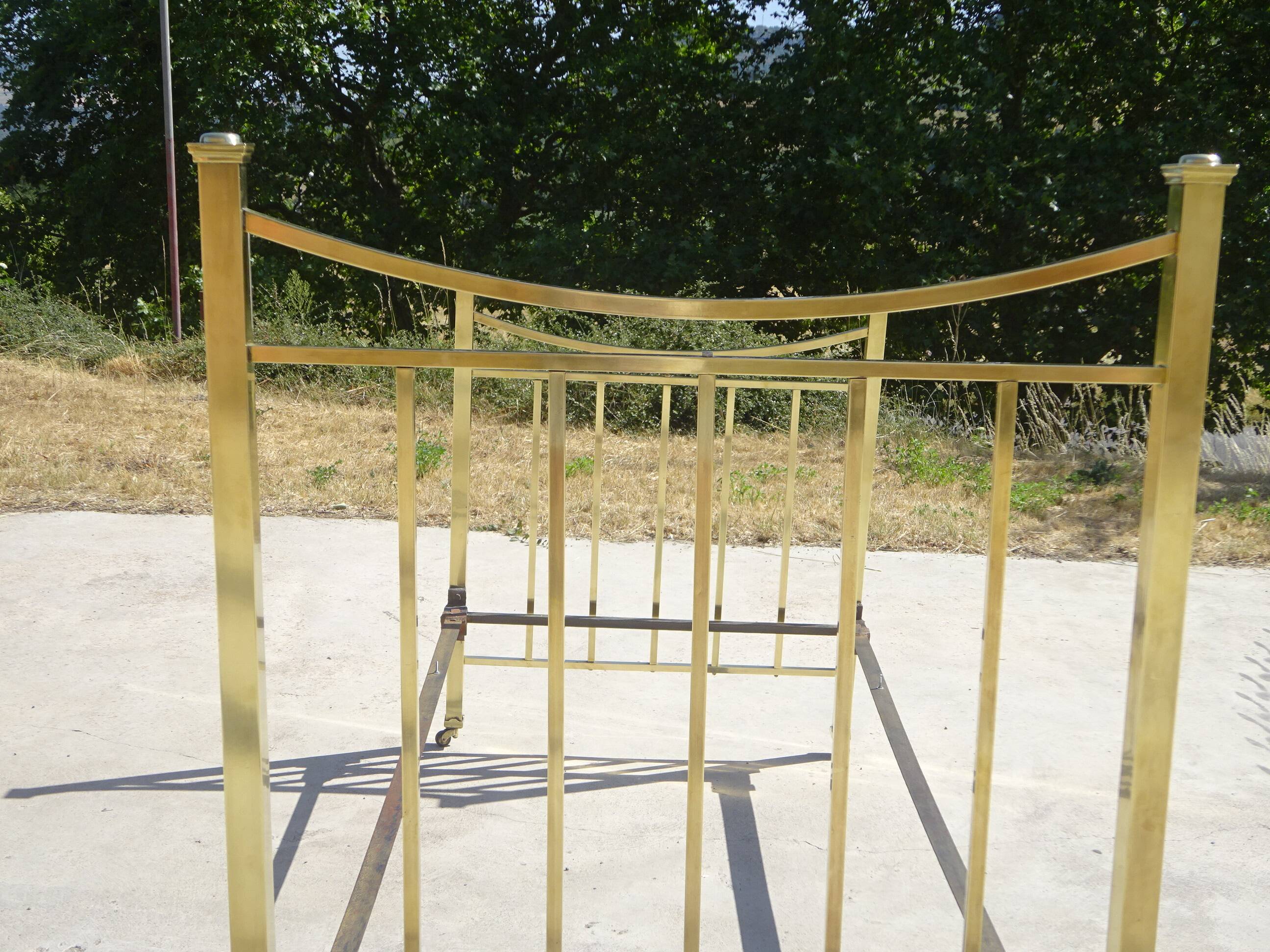 Antique gold-plated brass bed for one person.