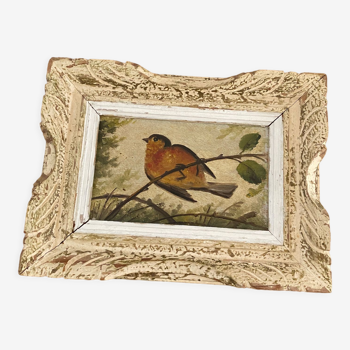 Vintage frame bird painting on a branch