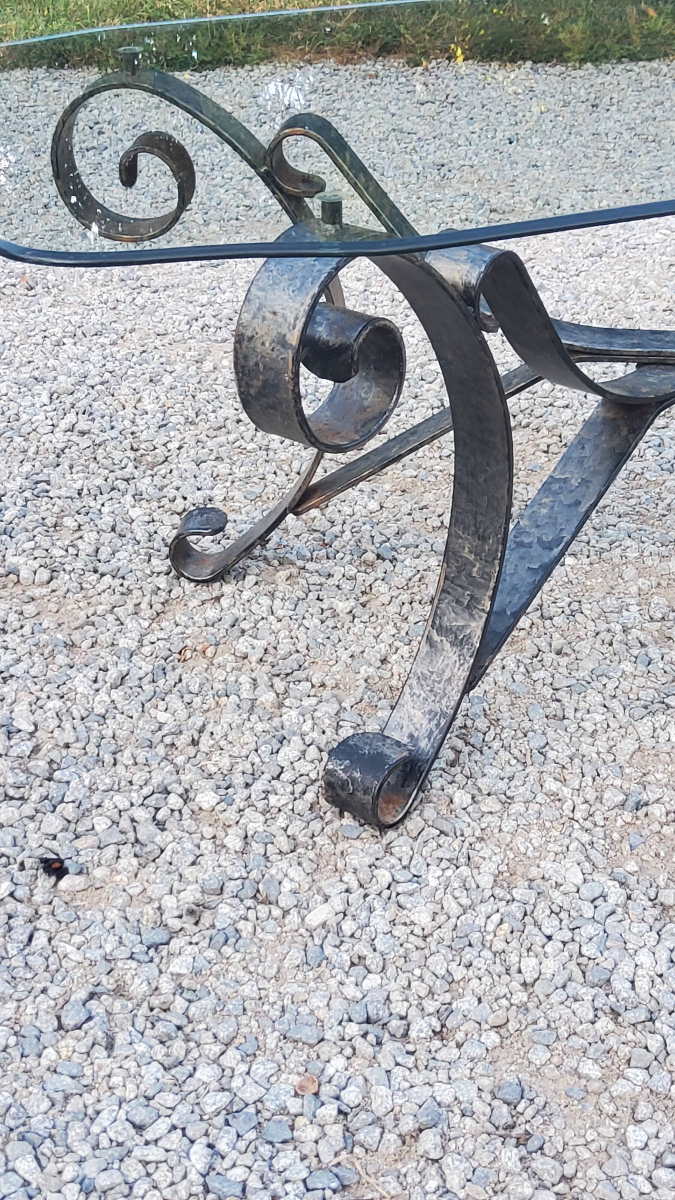 Coffee table from the 70s in wrought iron glass top bec de corbin