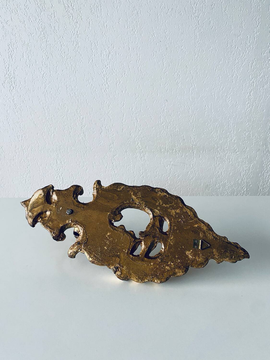 Gold wall candle holder