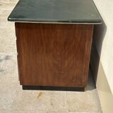 Modernist desk in wood and green moleskin upholstery