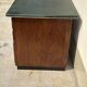 Modernist desk in wood and green moleskin upholstery