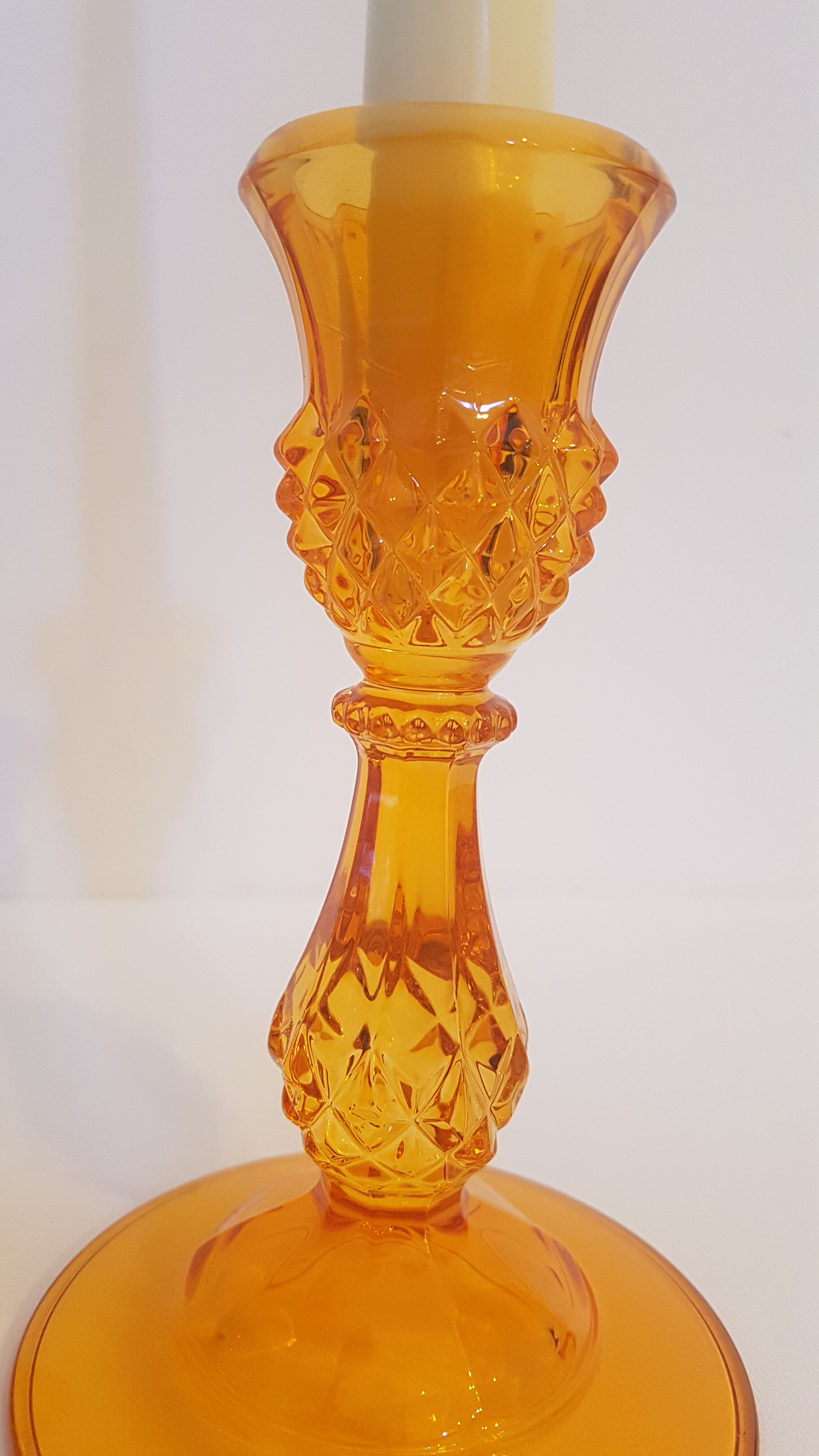 Set of 2 orange glass candle holders