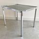 Vintage chrome side table with s smoked glass top