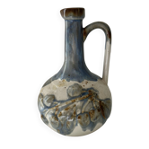 Cherry-decorated earthenware carafe