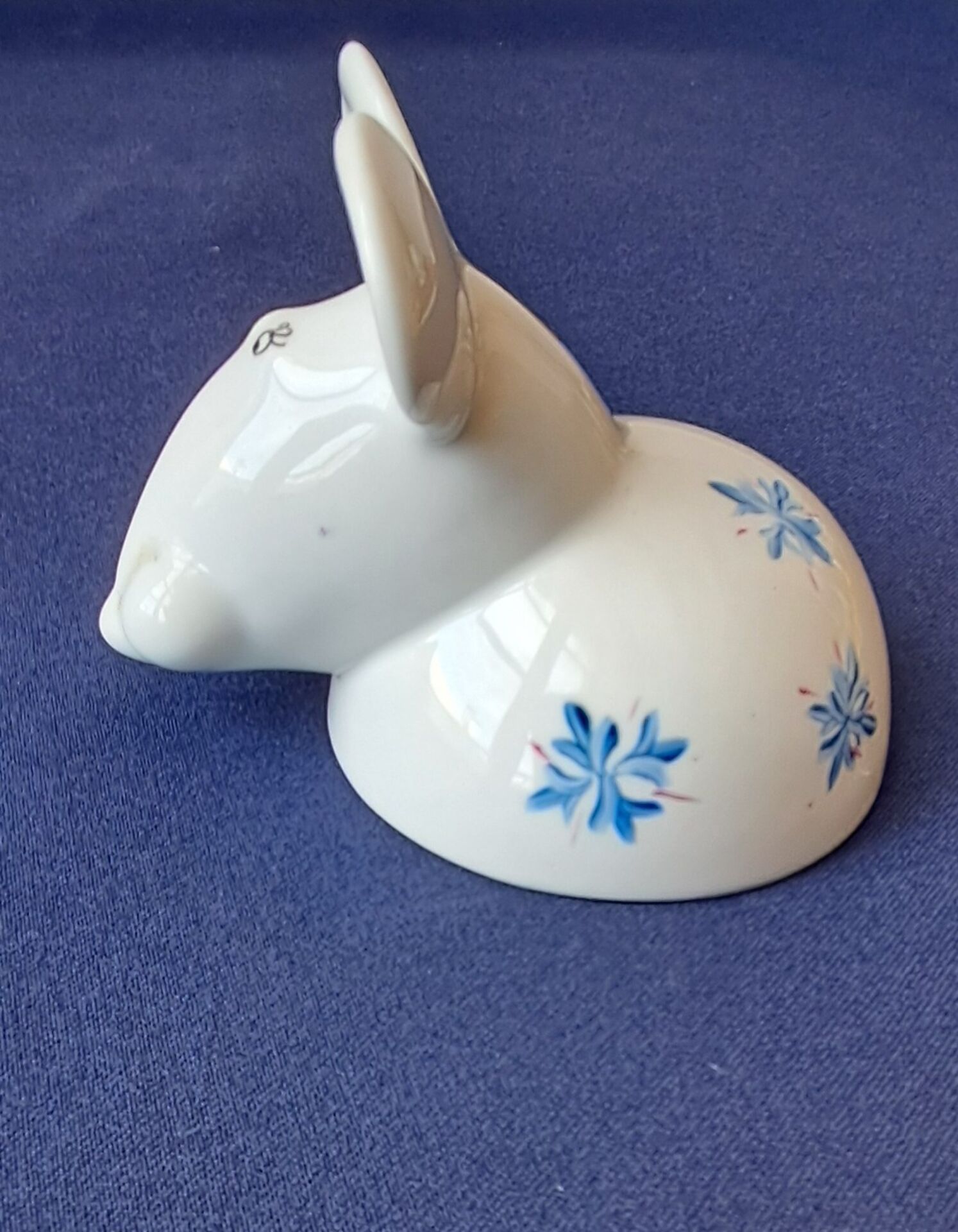 Salt cellar or porcelain salt shaker. Zoomorphic figurine of a mouse.