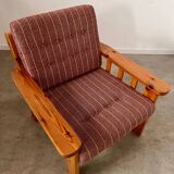 Old vintage Scandinavian design pine armchair from the 70s