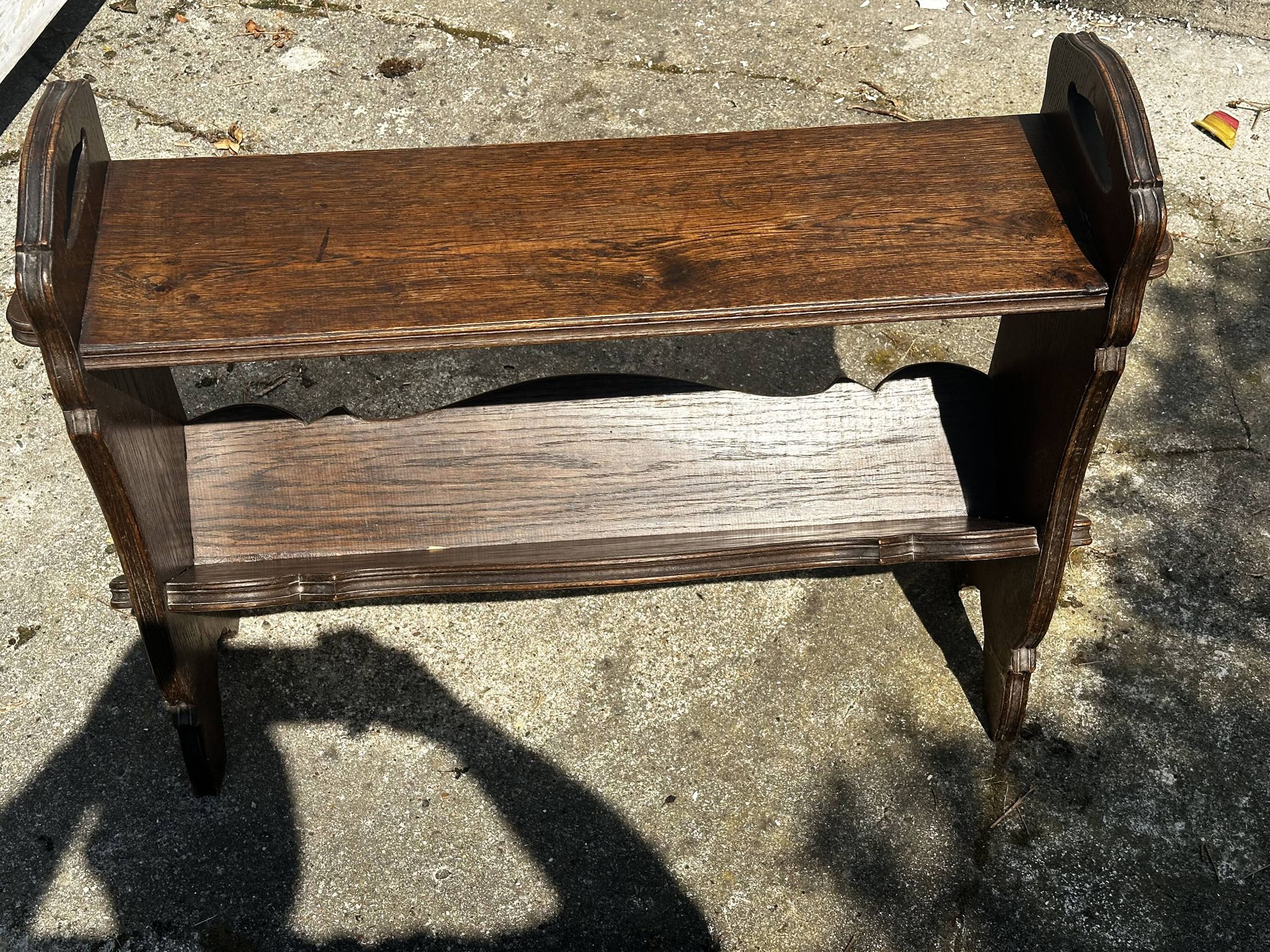 Small magazine rack / accent furniture in dark oak, late 19th century.