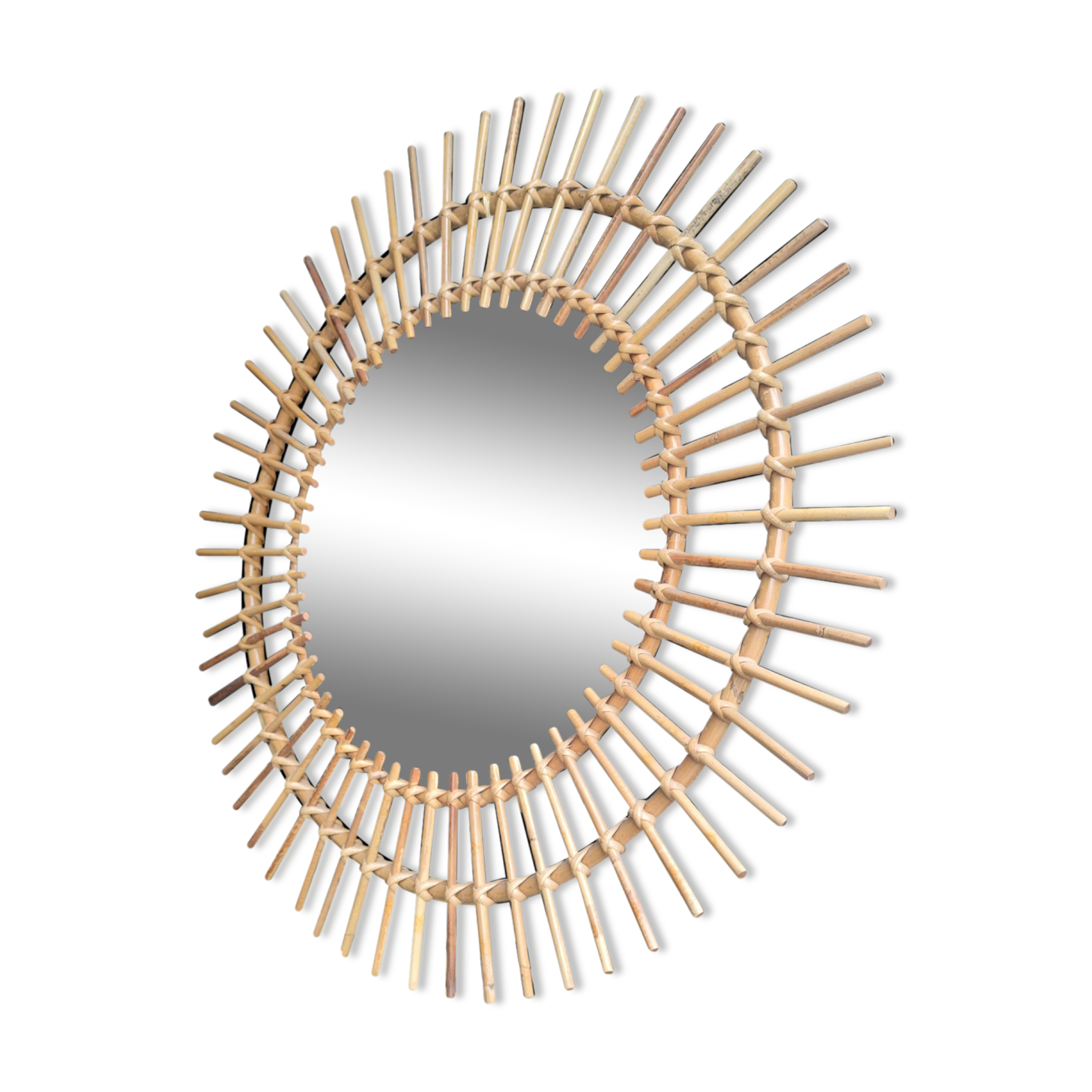Rattan sunburst mirror, circa 1960, 72 cm in diameter