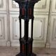 A pedestal table in blackened wood and burl veneer, superb assembly of moldings circa 1880