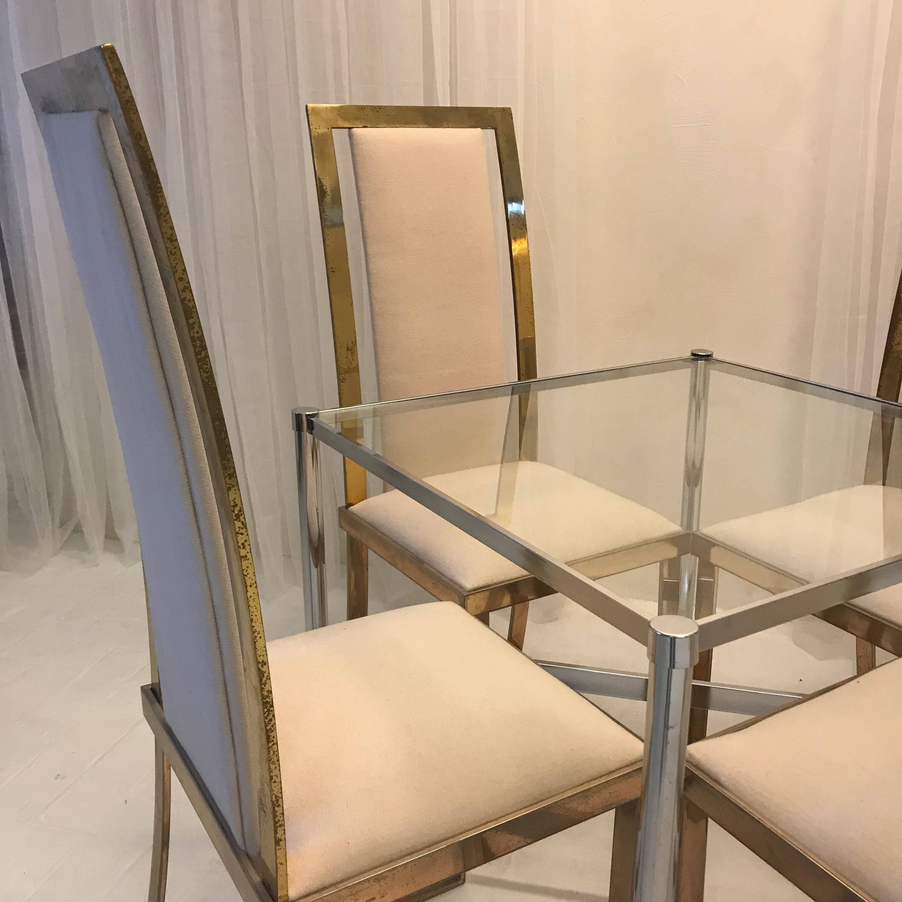 Set of 2 Michel Mangematin chairs in brass and virgin wool.