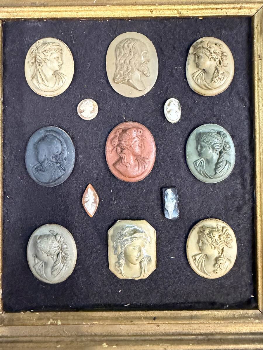 Collection of cameos and intaglios, shells and lava stones, around 1900.