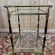 Glass, brass, and wood side table from the 1950s/60s.