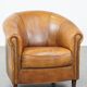 Cognac-colored sheep leather club chair with patina