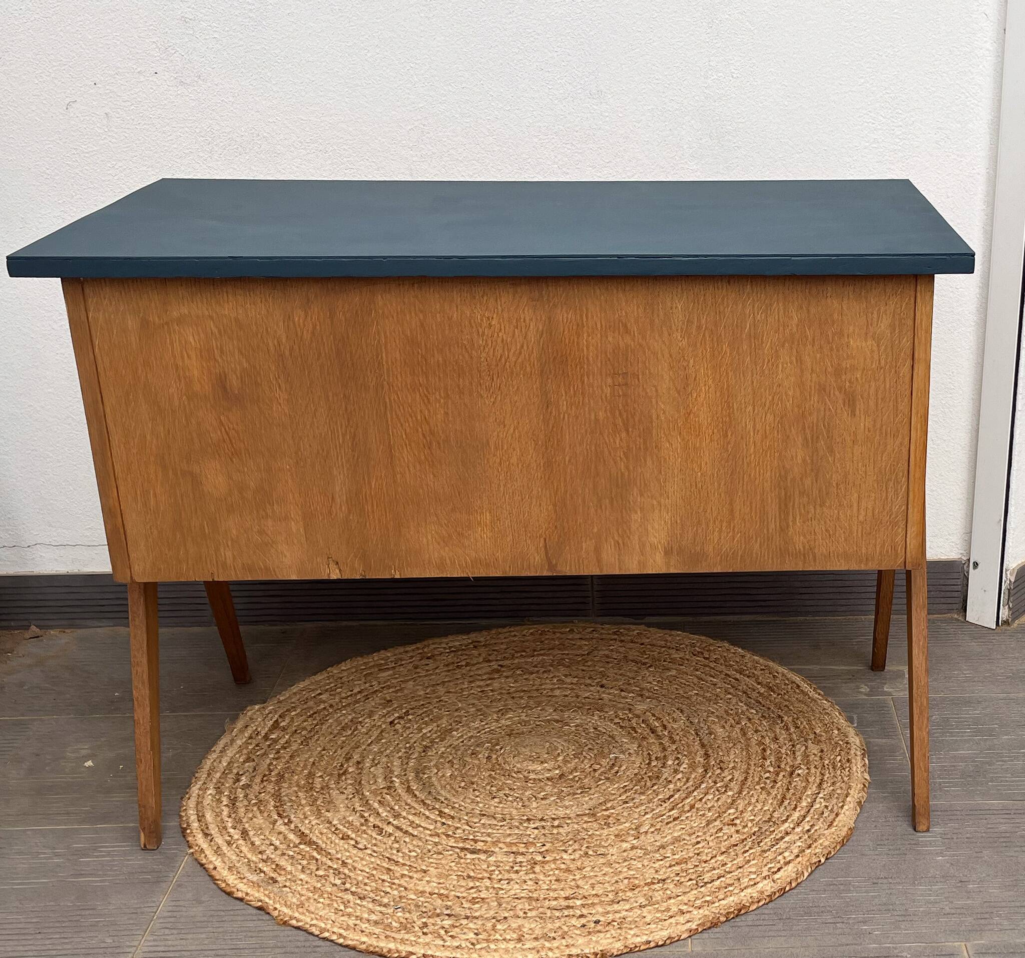 Scandinavian desk from the 1950s with compass legs.