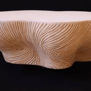 Spiral, designer coffee table with stone effect, unique handmade creation.