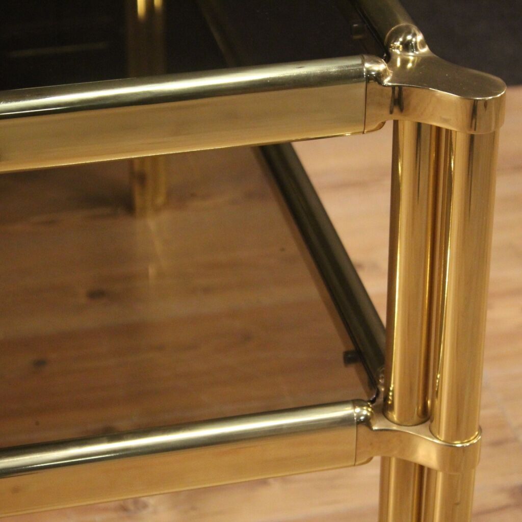 Italian console in gold metal