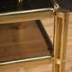 Italian console in gold metal