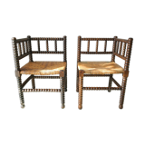 Pair of chairs corner fireplace turned beaded wood