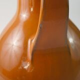 Orange vase with handle
